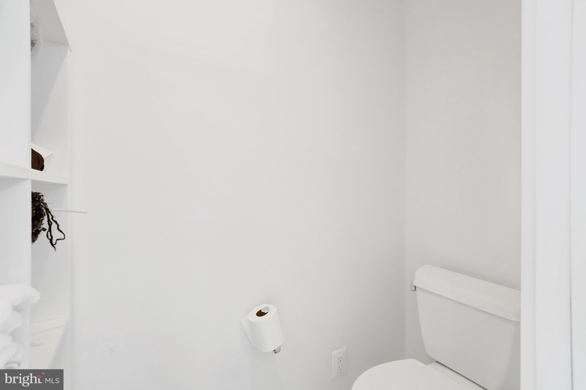 3017 Pine Spring Road Falls Church, VA 22042 - Photo 48 of 62 a white toilet sitting next to a white wall
