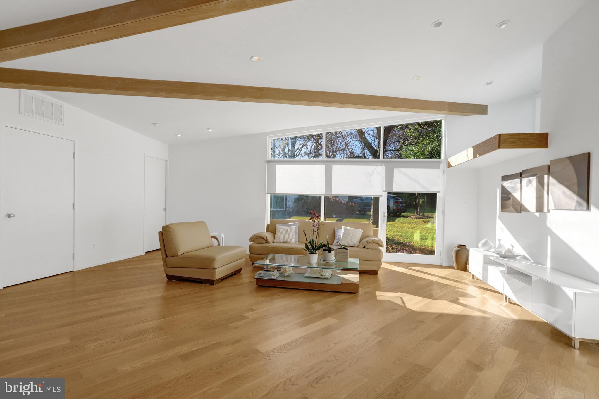 3017 Pine Spring Road Falls Church, VA 22042 - Photo 5 of 62 a living room with furniture and large windows