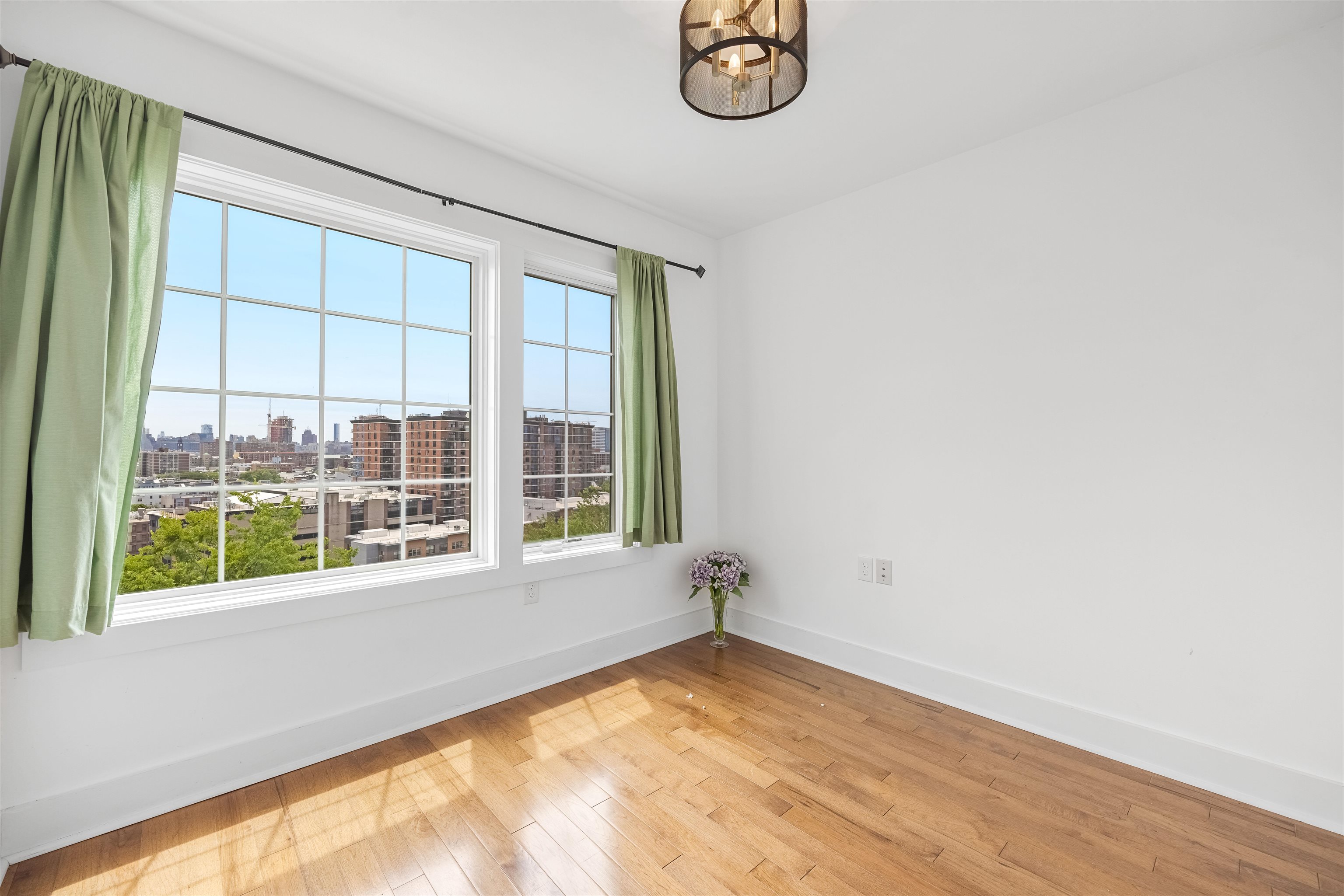 107 Mountain Road Jersey City, NJ 07307 - Photo 24 of 41 an empty room with a window