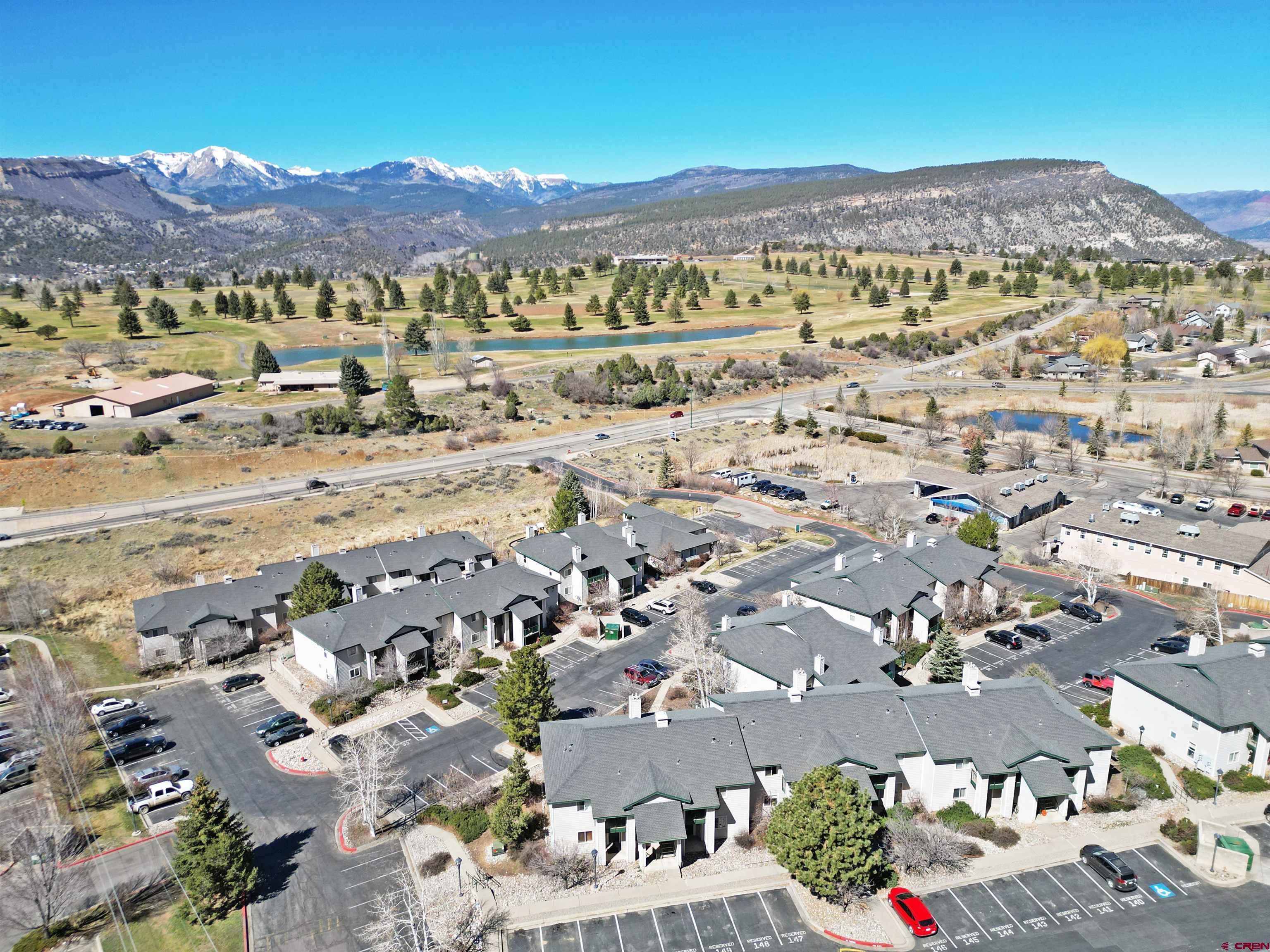 1100 Goeglein Gulch Road, Unit 223 Durango, CO 81301 - Photo 23 of 25 an aerial view of residential building and parking space