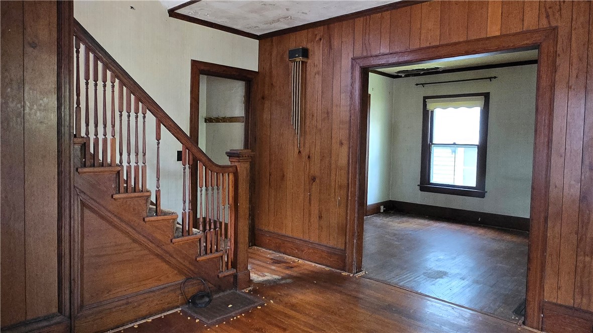 302 Field Street Rochester, NY 14620 - Photo 4 of 32 Foyer opens to the living room & kitchen.