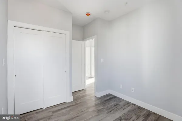 a view of a building with a backyard