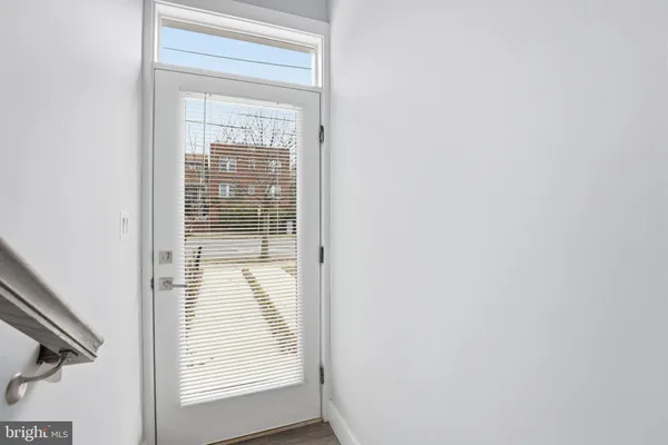 a kitchen with stainless steel appliances a refrigerator and a stove top oven