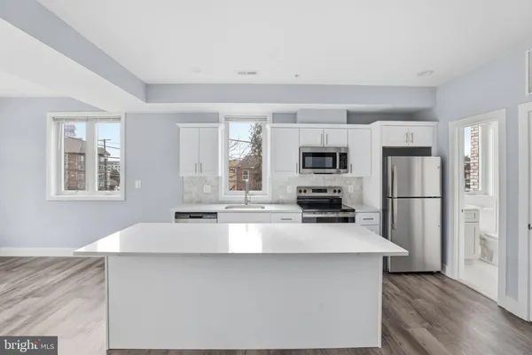 a picture of a bench in a white building
