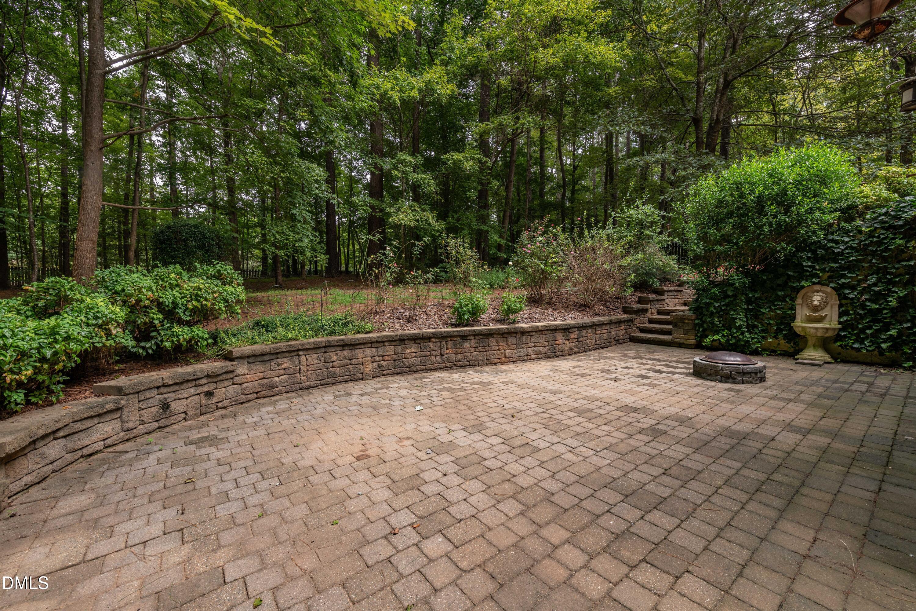 6832 Cool Pond Road Raleigh, NC 27613 - Photo 19 of 27 a view of a yard