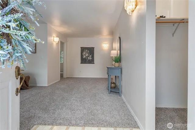 a view of a room that has a bench in it