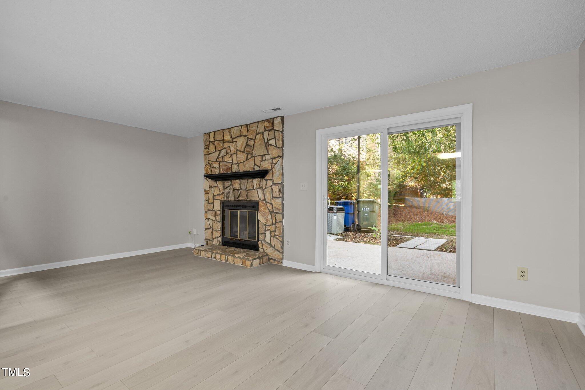 7837 Stephanie Lane Raleigh, NC 27615 - Photo 7 of 27 an empty room with windows