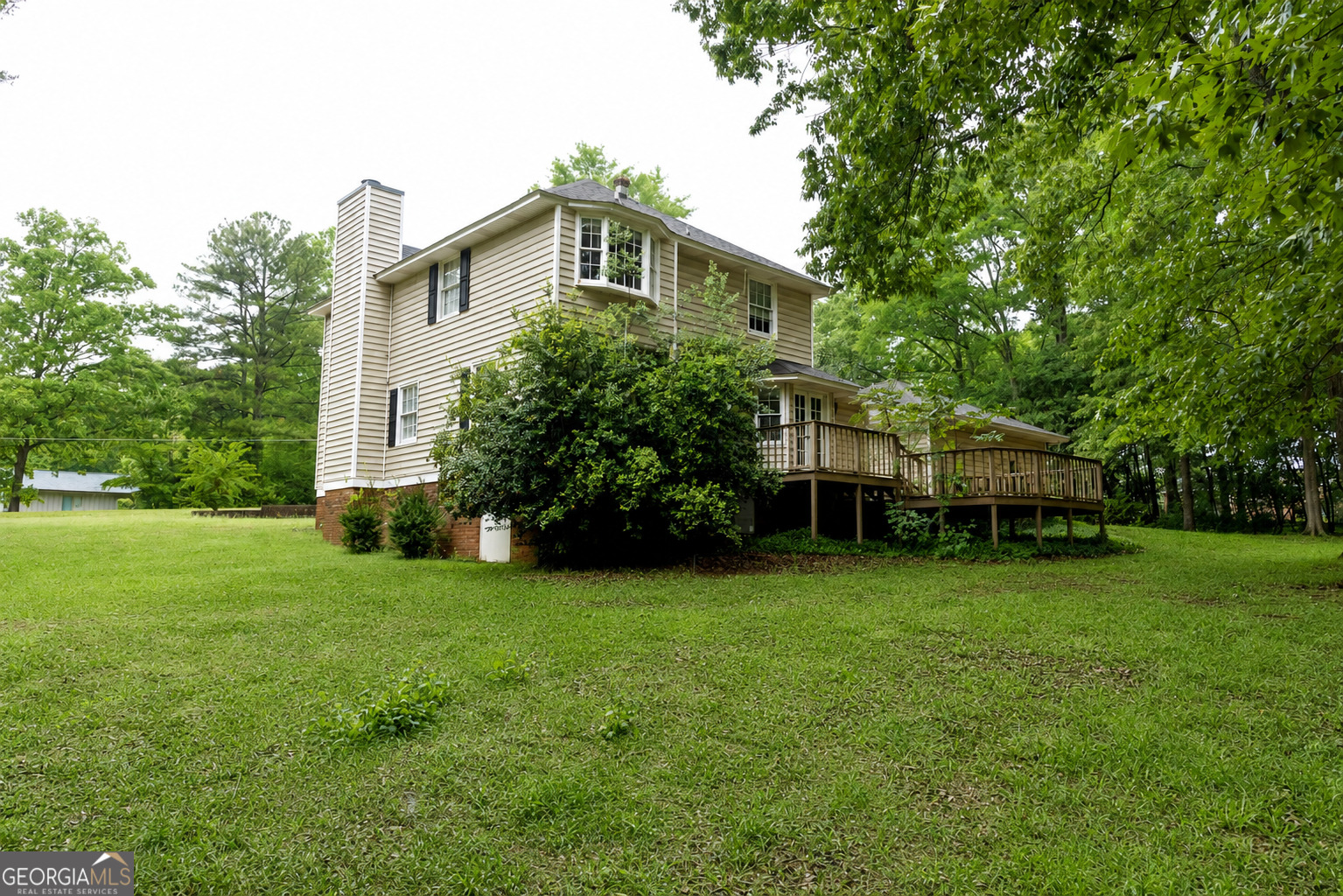 124 David Drive Thomaston, GA 30286 - Photo 42 of 43 a front view of a house with garden
