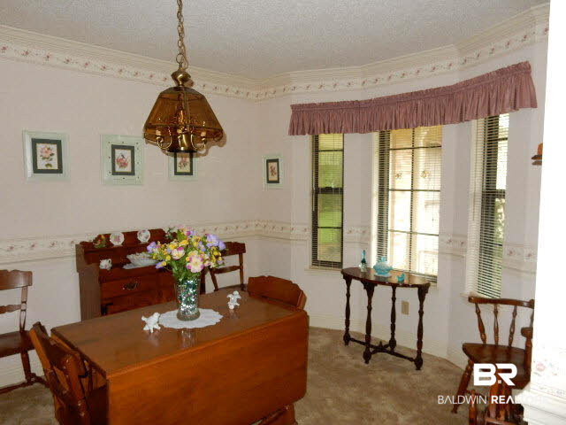 2744 Santa Rosa Drive Lillian, AL 36549 - Photo 9 of 27 Dining room with bay window