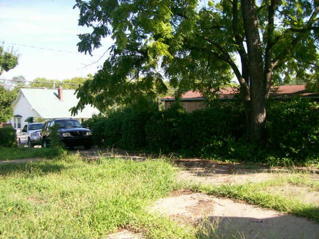 2104 South Main Street Springfield, TN 37172 - Photo 6 of 6 a backyard of a house with lots of green space and fountain