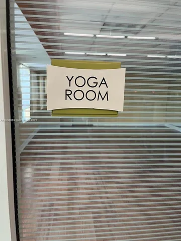 a view of a door and a window