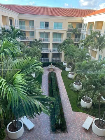 a view of a garden with potted plants