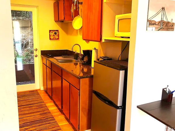 a hallway with storage and utility