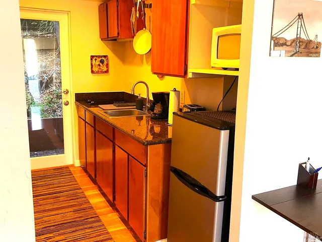 a hallway with storage and utility