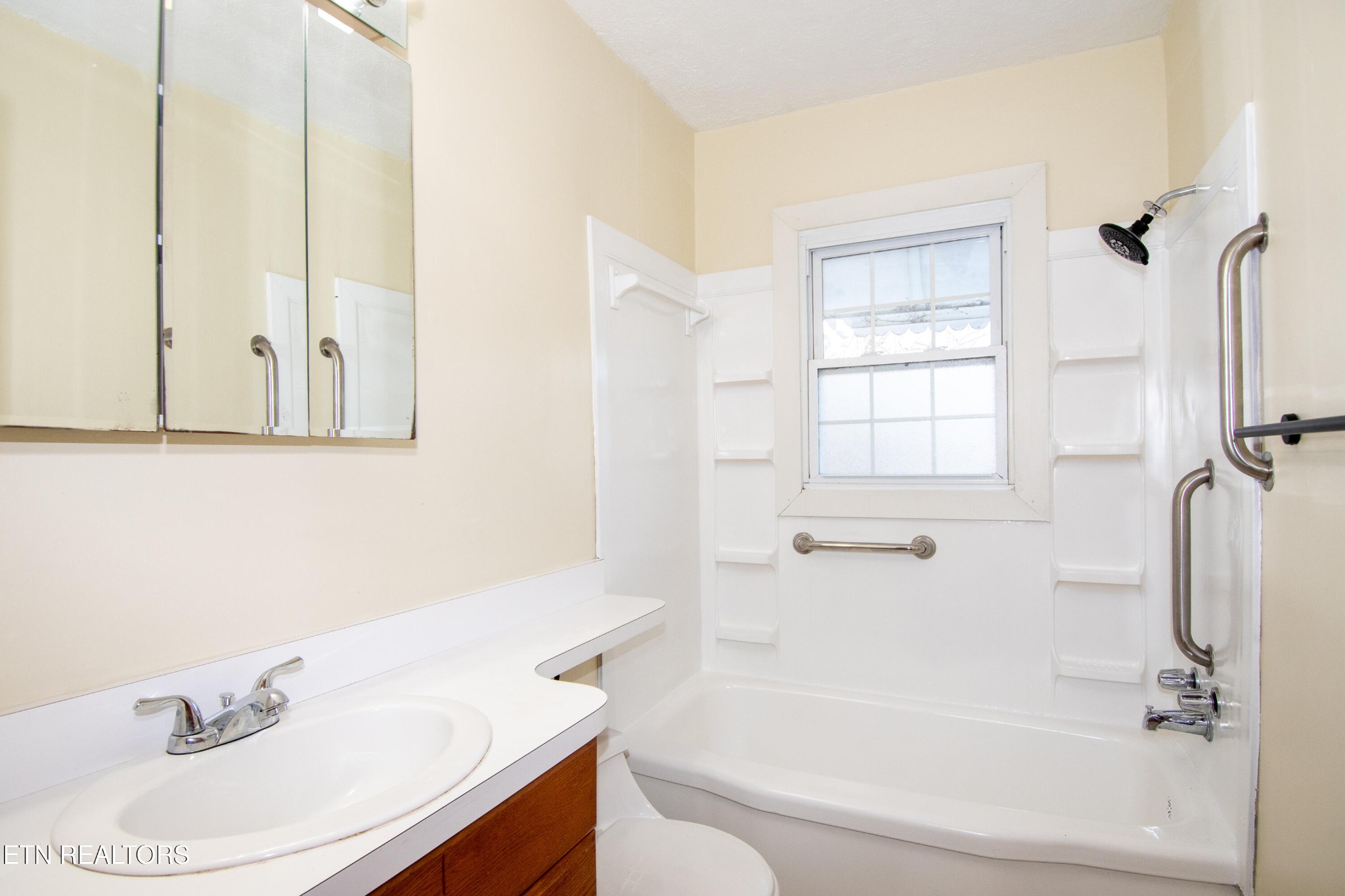 471 East Lincoln Road Alcoa, TN 37701 - Photo 17 of 47 a bathroom with a sink toilet and shower