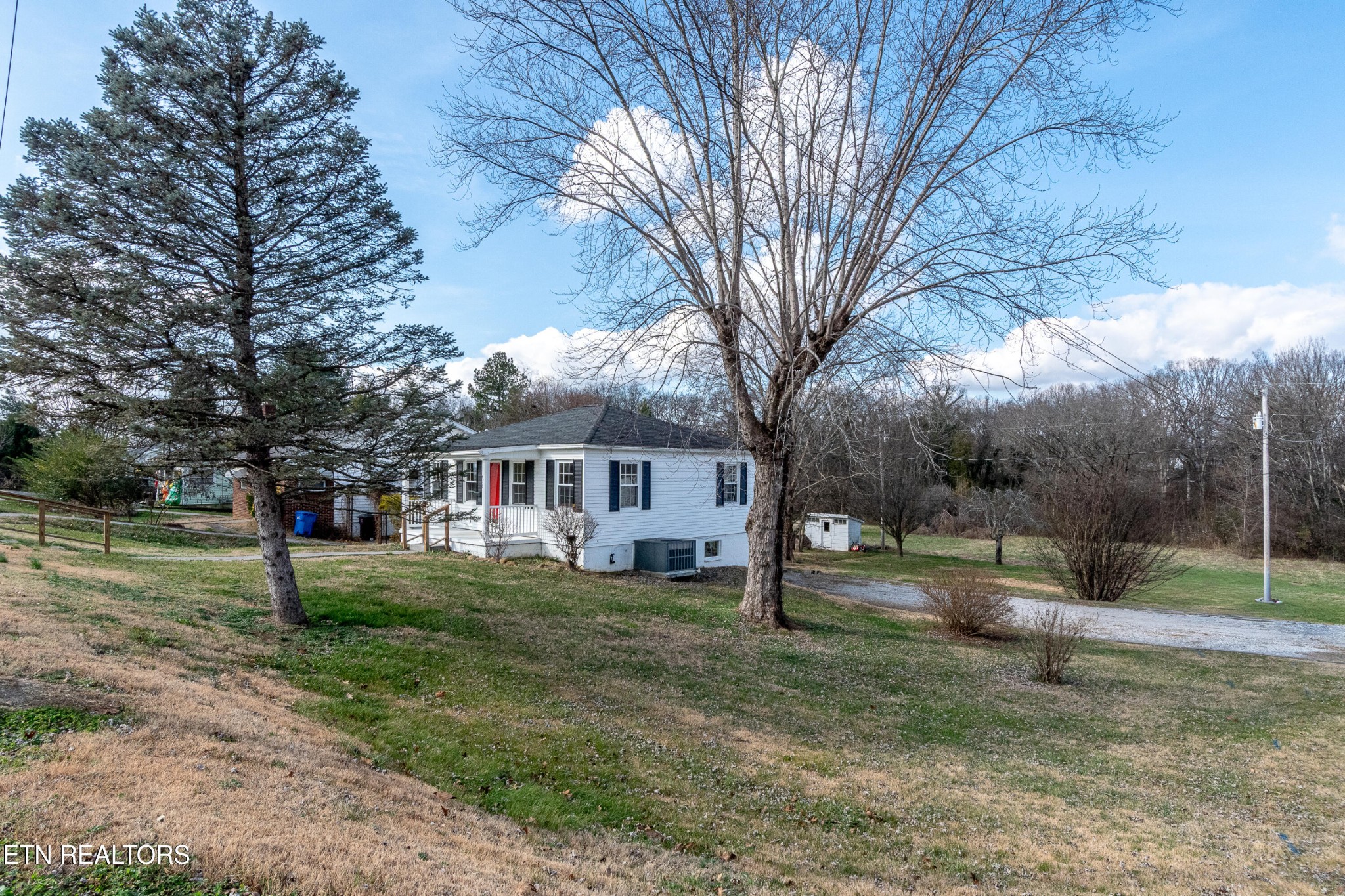 471 East Lincoln Road Alcoa, TN 37701 - Photo 2 of 47 a view of a yard with a house and a tree