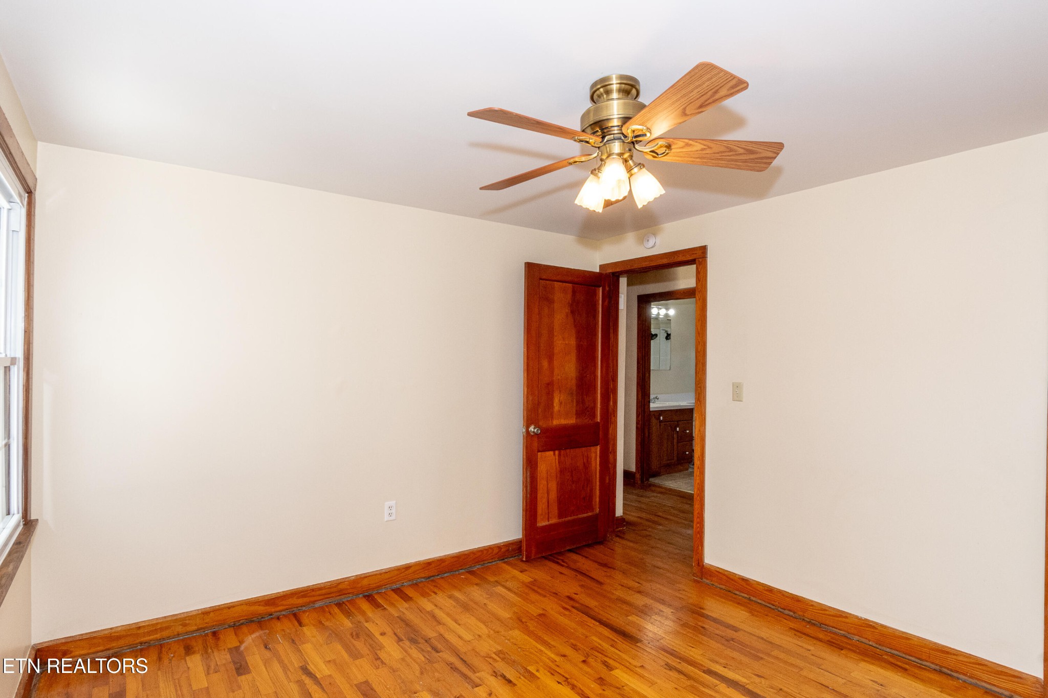 471 East Lincoln Road Alcoa, TN 37701 - Photo 22 of 47 a view of an empty room with wooden floor