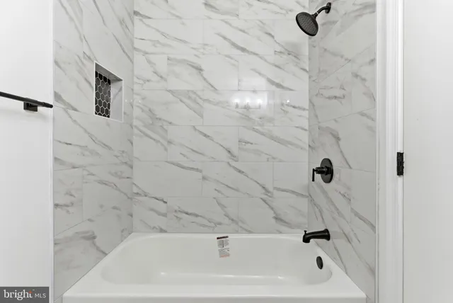 a bathroom with a bathtub