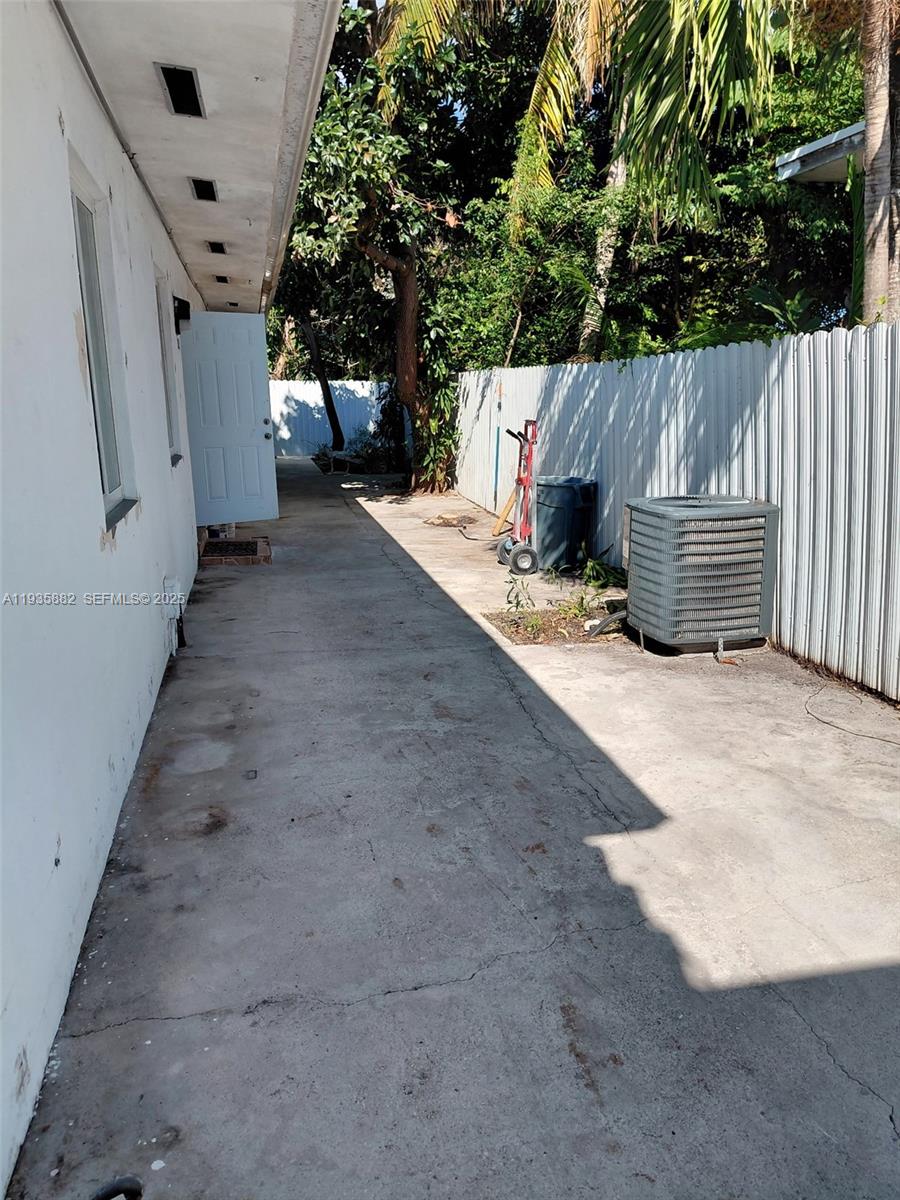 3503 Southwest 24th Street, Unit 3503 Miami, FL 33145 - Photo 12 of 12 a view of a house with backyard and sitting area