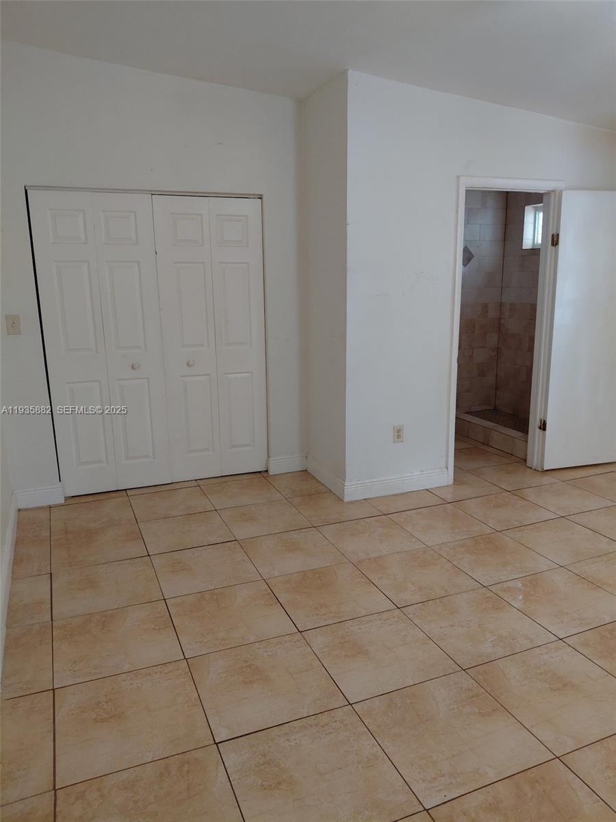 3503 Southwest 24th Street, Unit 3503 Miami, FL 33145 - Photo 7 of 12 a view of an empty room and entryway