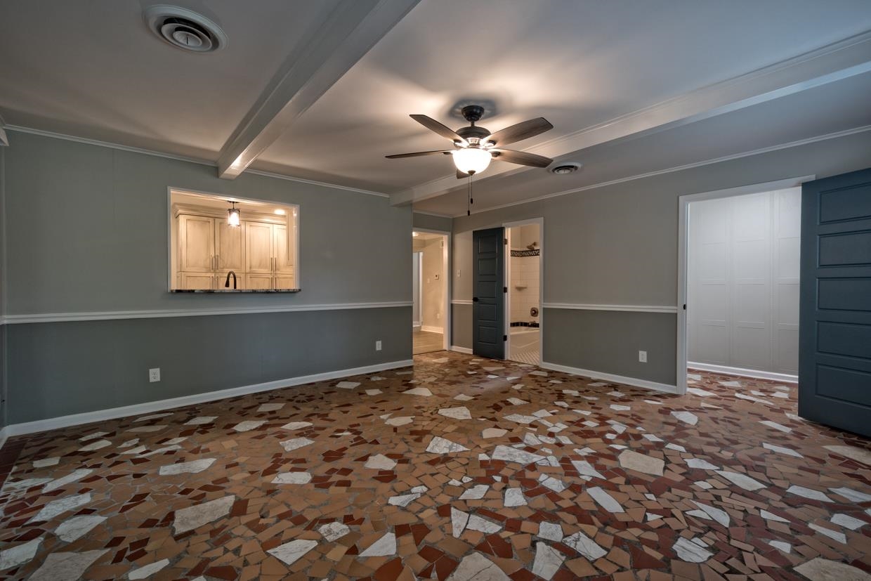 4582 Boyce Road Memphis, TN 38117 - Photo 11 of 22 a view of a big room with windows and cabinet