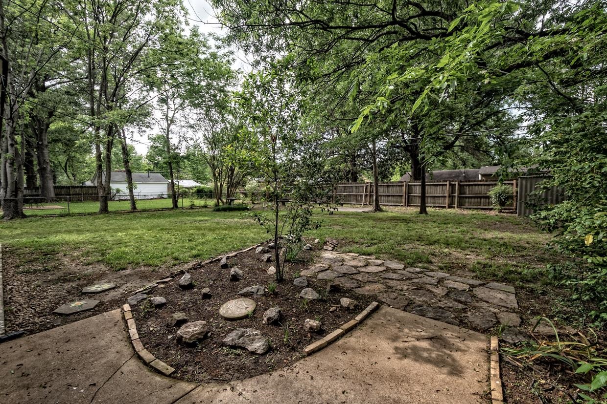 4582 Boyce Road Memphis, TN 38117 - Photo 18 of 22 a view of a backyard with a garden