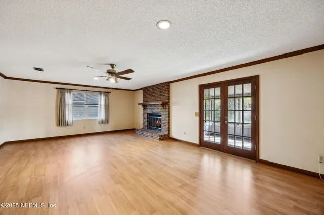 an empty room with windows