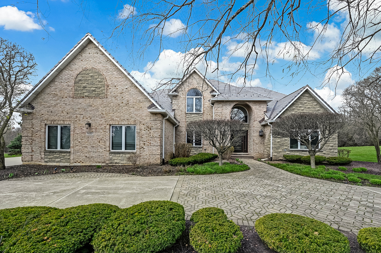 9150 Falling Waters Drive West Burr Ridge, IL 60527 - Photo 1 of 49