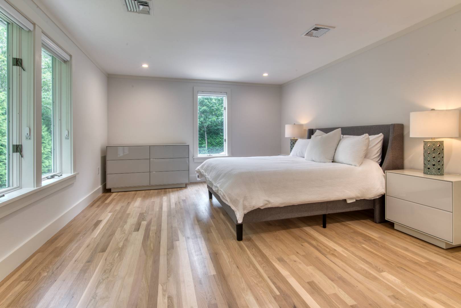 3 Short Lane East Hampton, NY 11937 - Photo 8 of 13 a bedroom with a large bed and a window