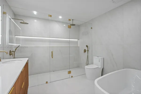 a view of hallway with walk in closet