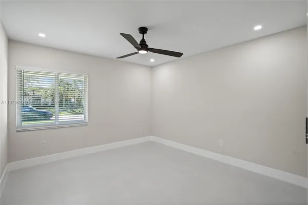 a bathroom with a sink and a window