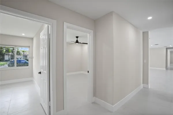 a view of a swimming pool with a yard