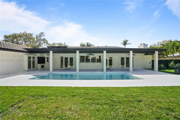 front view of a house with a yard