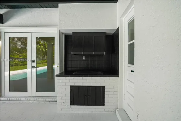 an aerial view of a house with a garden