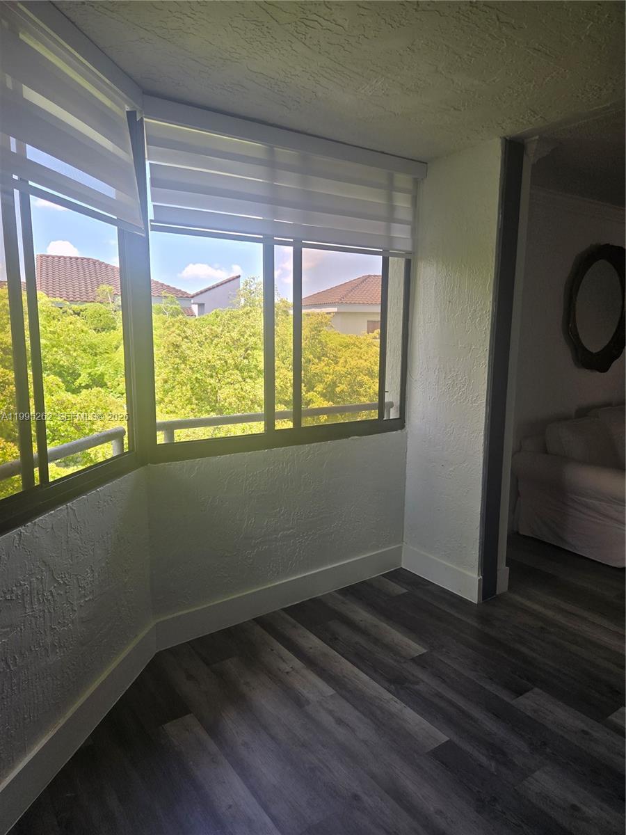 8365 Southwest 152nd Avenue, Unit 3 Miami, FL 33193 - Photo 4 of 25 a room with a window