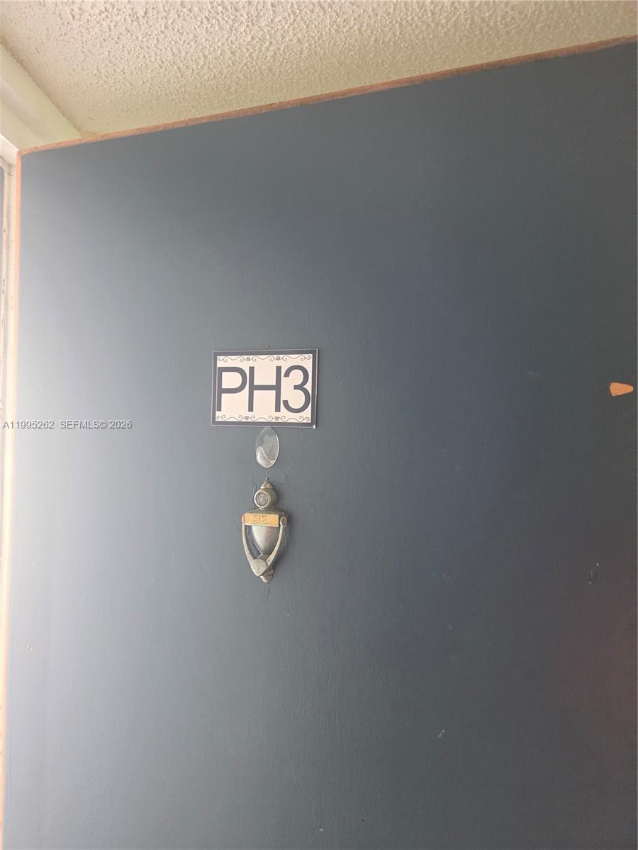 8365 Southwest 152nd Avenue, Unit 3 Miami, FL 33193 - Photo 10 of 25 a view of a wall with a sink