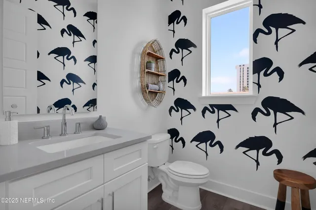 a bathroom with a toilet and a sink