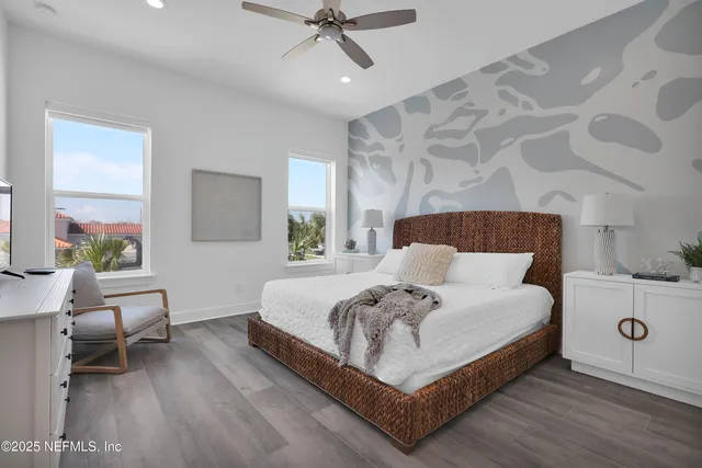 a bedroom with a bed and a table