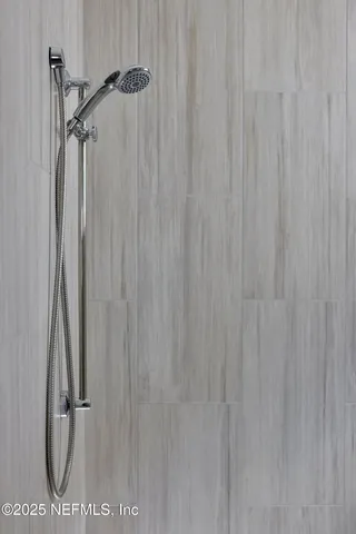 a bathroom with a shower curtain