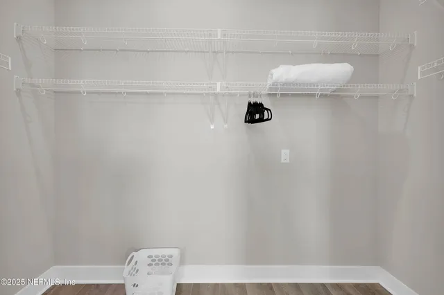 a view of small space with racks on the wall