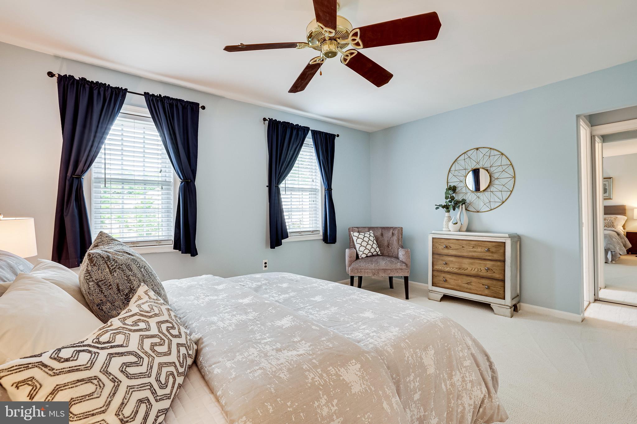 11962 Sentinel Point Court Reston, VA 20191 - Photo 33 of 62 The primary bedroom also has a ceiling fan.