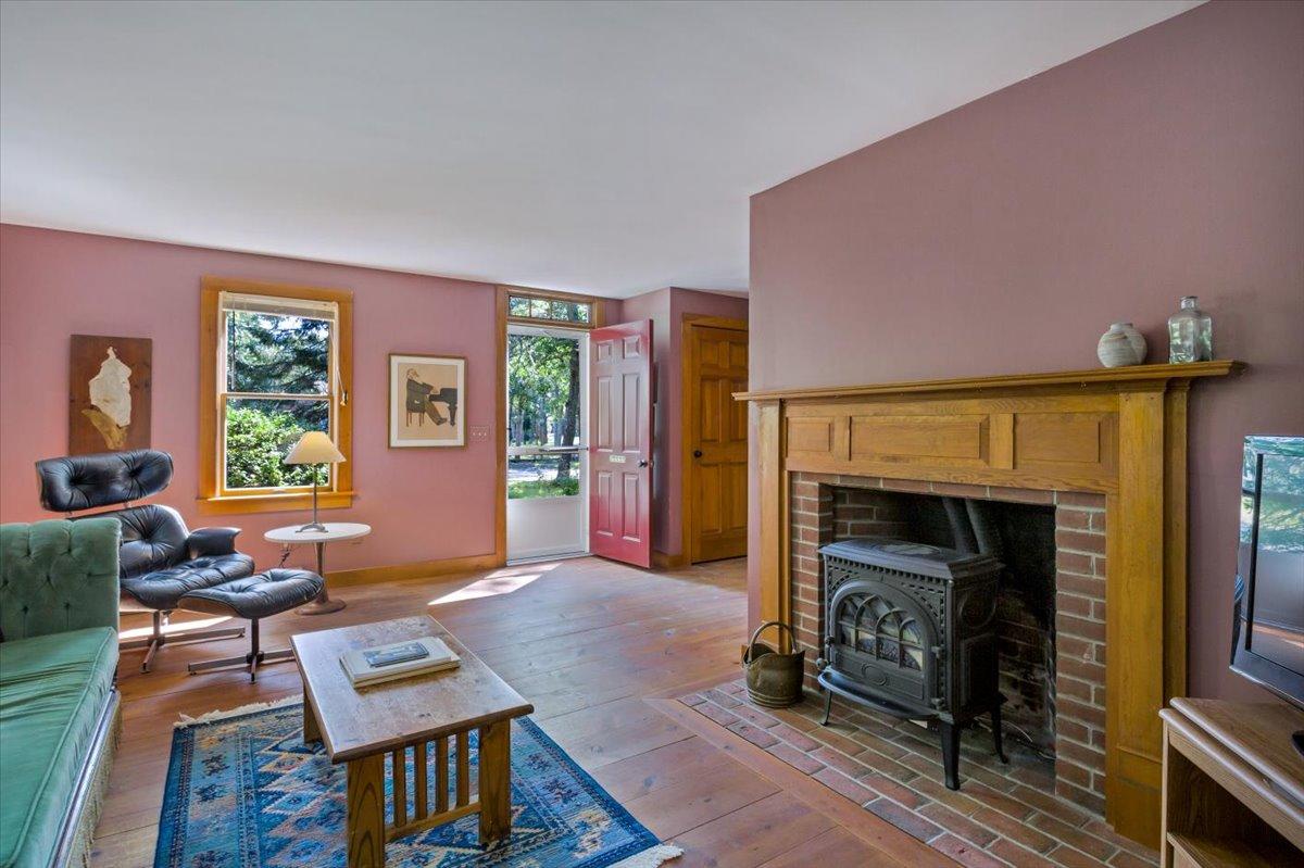 45 Danielle Drive Eastham, MA 02642 - Photo 12 of 42 a living room with furniture and a fireplace