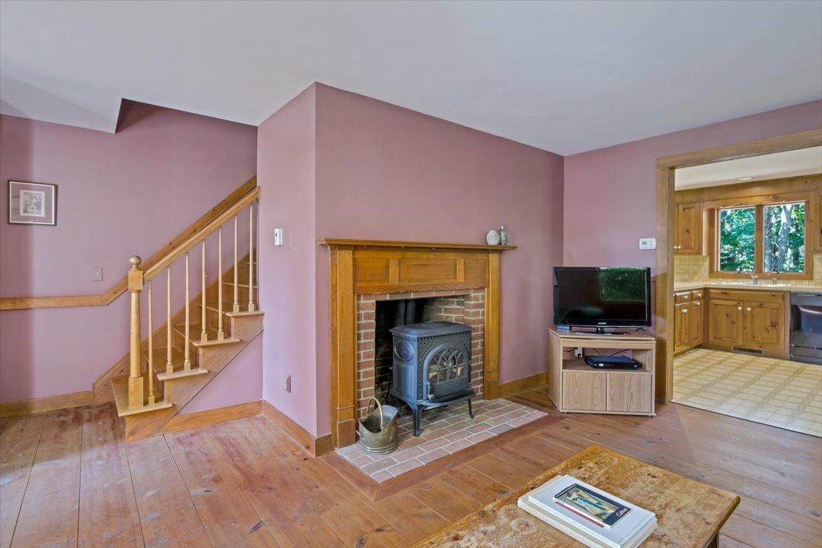 45 Danielle Drive Eastham, MA 02642 - Photo 15 of 42 a living room with furniture and a fireplace