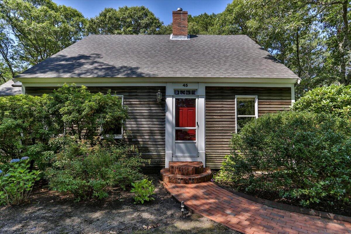 45 Danielle Drive Eastham, MA 02642 - Photo 2 of 42 a view of house with outdoor space and sitting space