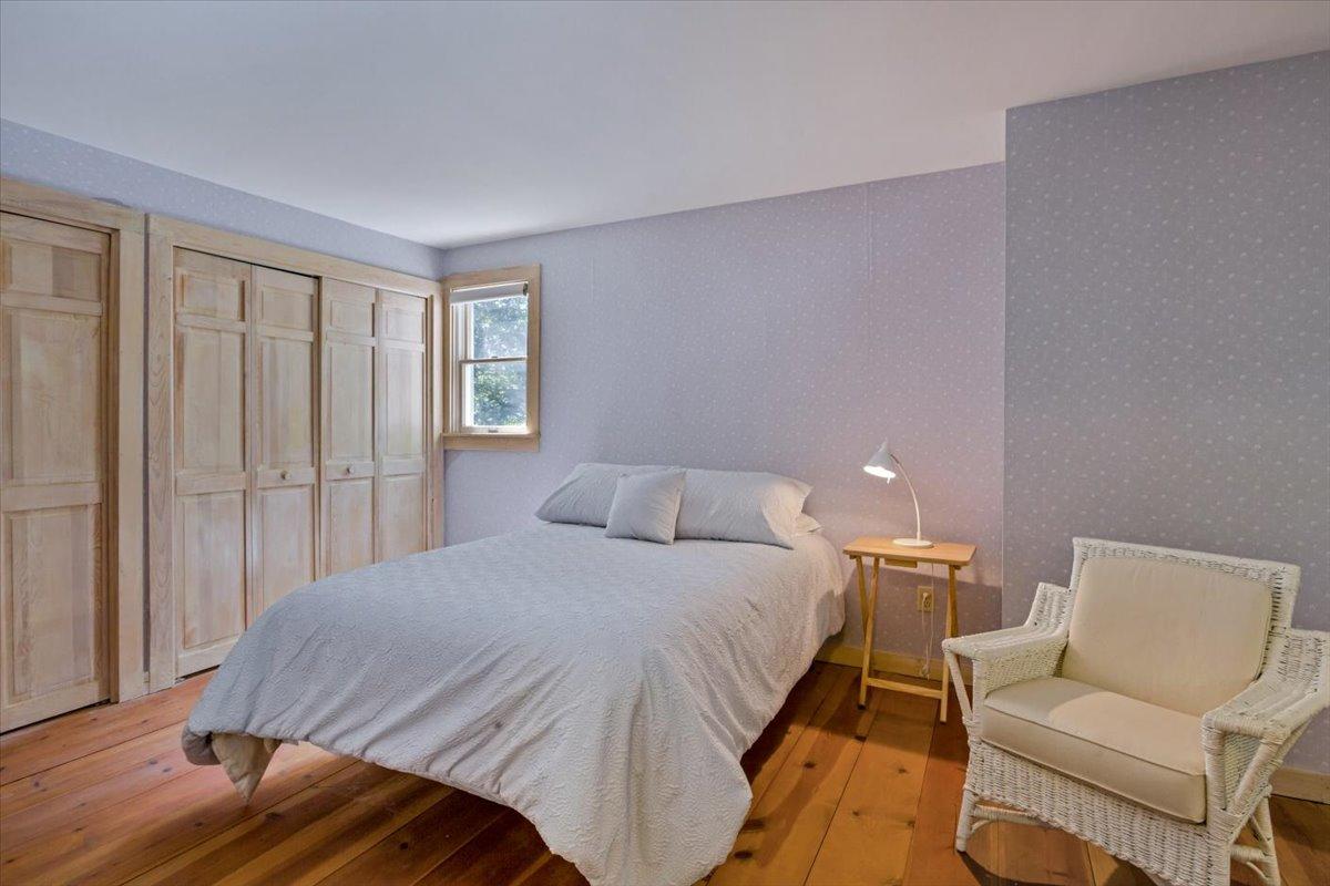 45 Danielle Drive Eastham, MA 02642 - Photo 25 of 42 a bedroom with a bed and a couch