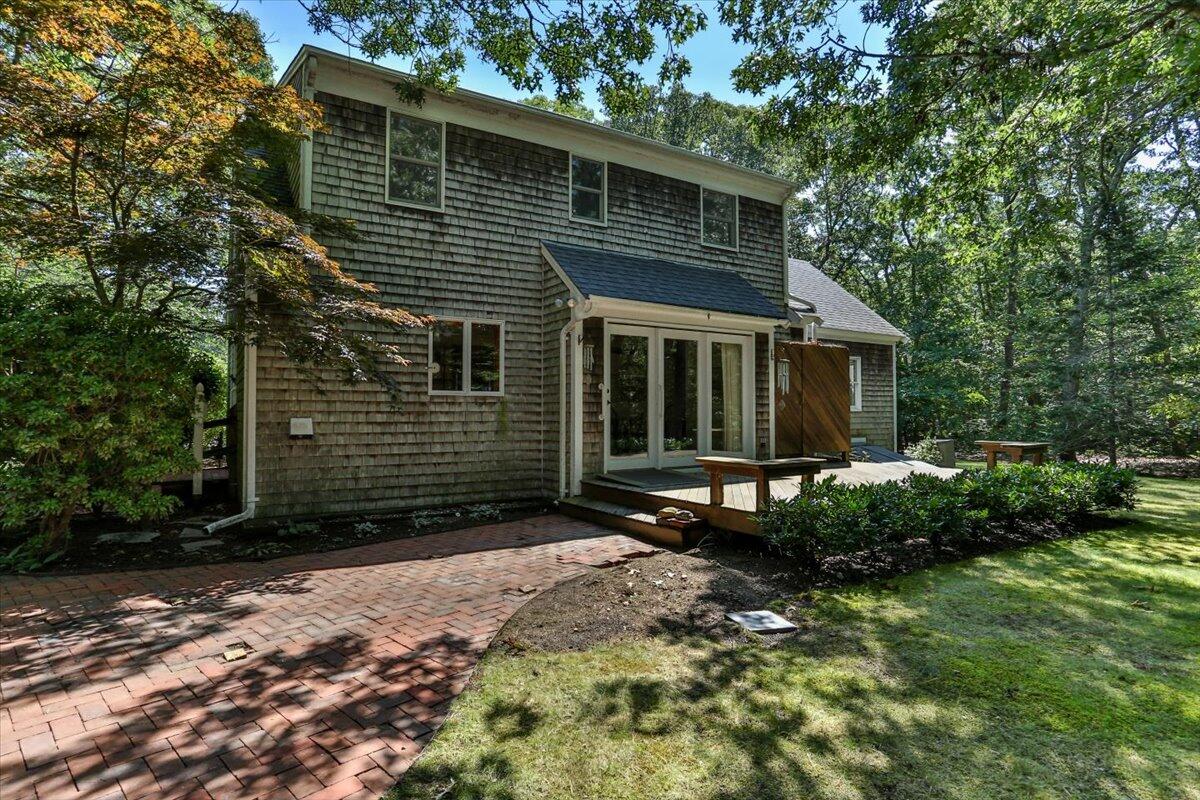 45 Danielle Drive Eastham, MA 02642 - Photo 3 of 42 a front view of a house with a yard