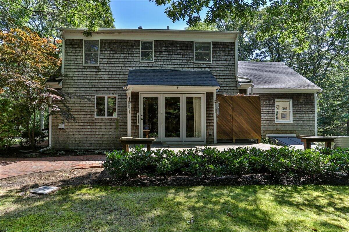 45 Danielle Drive Eastham, MA 02642 - Photo 37 of 42 a front view of a house with a yard