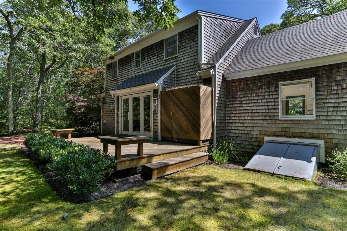 45 Danielle Drive Eastham, MA 02642 - Photo 38 of 42 a view of backyard with a garden and stairs