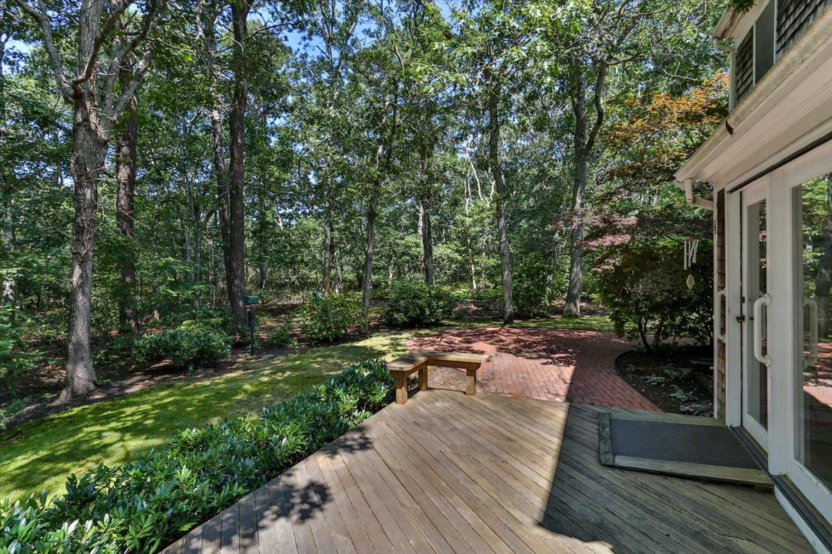 45 Danielle Drive Eastham, MA 02642 - Photo 40 of 42 a view of a backyard with sitting area
