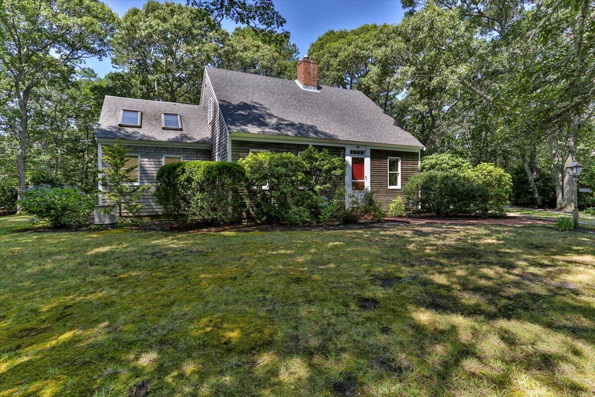 45 Danielle Drive Eastham, MA 02642 - Photo 42 of 42 a front view of a house with garden